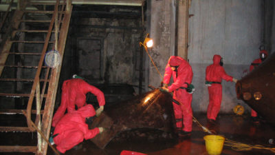 Team working on asbestos removal